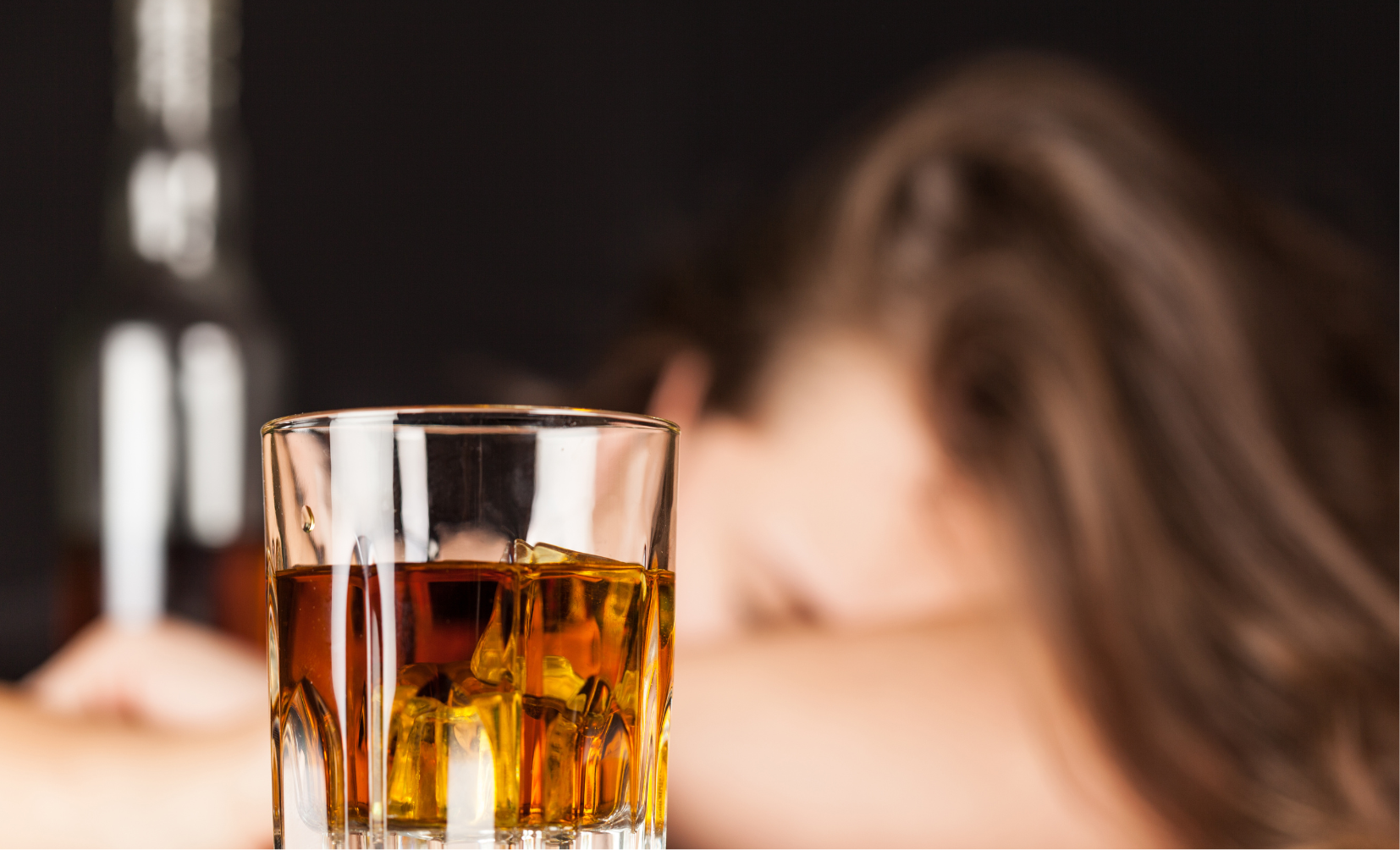 A woman fell asleep after drinking to much alcohol.